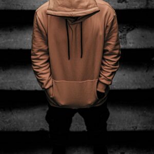 Brown hoodie on staircase