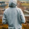 Man in grey pullover hoodie