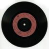 Vinyl record on white table