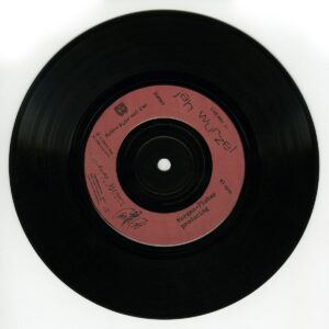Vinyl record on white table