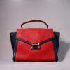 Red and blue handbag