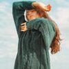 Woman in blue sweater