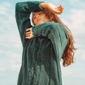 Woman in blue sweater