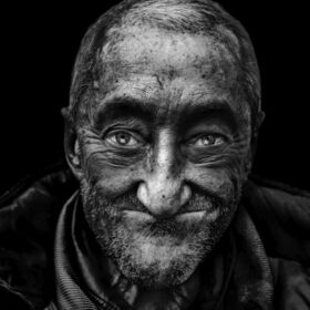 Smiling man in leather jacket