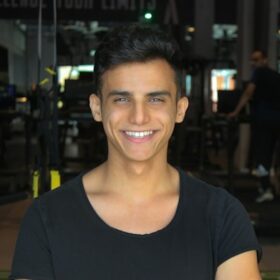 Smiling woman in black tee