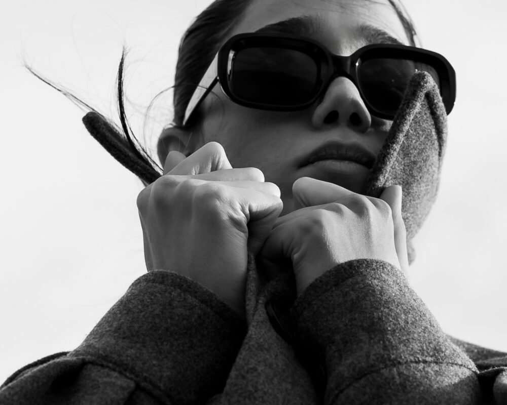 Woman in sunglasses on phone
